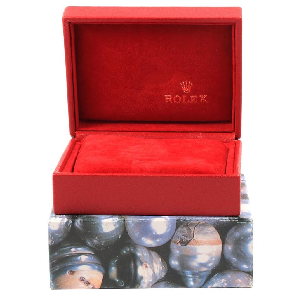 This image shows an empty red Rolex President 79138 Women's Yellow Gold Champagne Dial 79138 Women's Yellow Gold Champagne Dial model watch box, with Rolex branding on the inside lid.