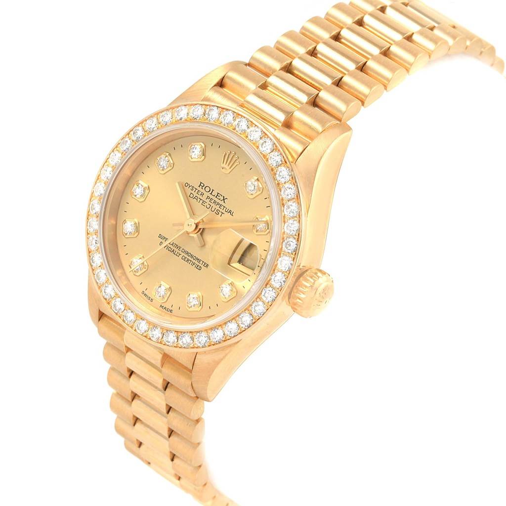The Rolex President 79138 Women's Yellow Gold Champagne Dial 79138 Women's Yellow Gold Champagne Dial model watch is shown at an angle highlighting the face, bezel, crown, and partially the bracelet.