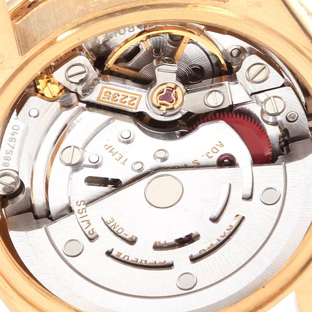 This close-up image shows the intricate mechanical movement of the Rolex President 79138 Women's Yellow Gold Champagne Dial 79138 Women's Yellow Gold Champagne Dial model watch.