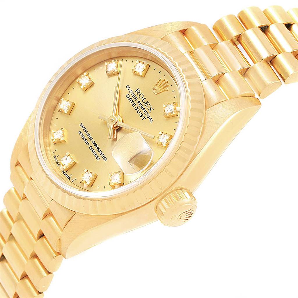 The image shows a side angle of the Rolex President 69178 Women's Yellow Gold Champagne Dial 69178 Women's Yellow Gold Champagne Dial model watch, highlighting the gold dial, crown, and part of the bracelet.
