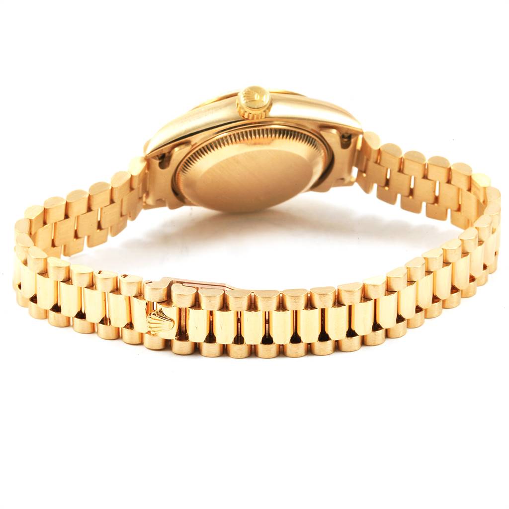 The image shows the back case and bracelet of a Rolex President 69178 Women's Yellow Gold Champagne Dial 69178 Women's Yellow Gold Champagne Dial model watch, viewed from a slightly elevated rear angle.
