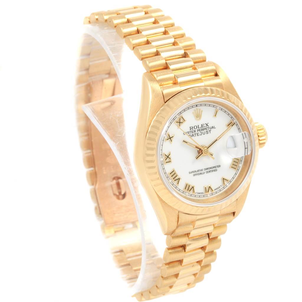 This image shows a side view of the Rolex President 69178 Women's Yellow Gold White Dial 69178 Women's Yellow Gold White Dial model watch, including its dial, bezel, crown, and bracelet.