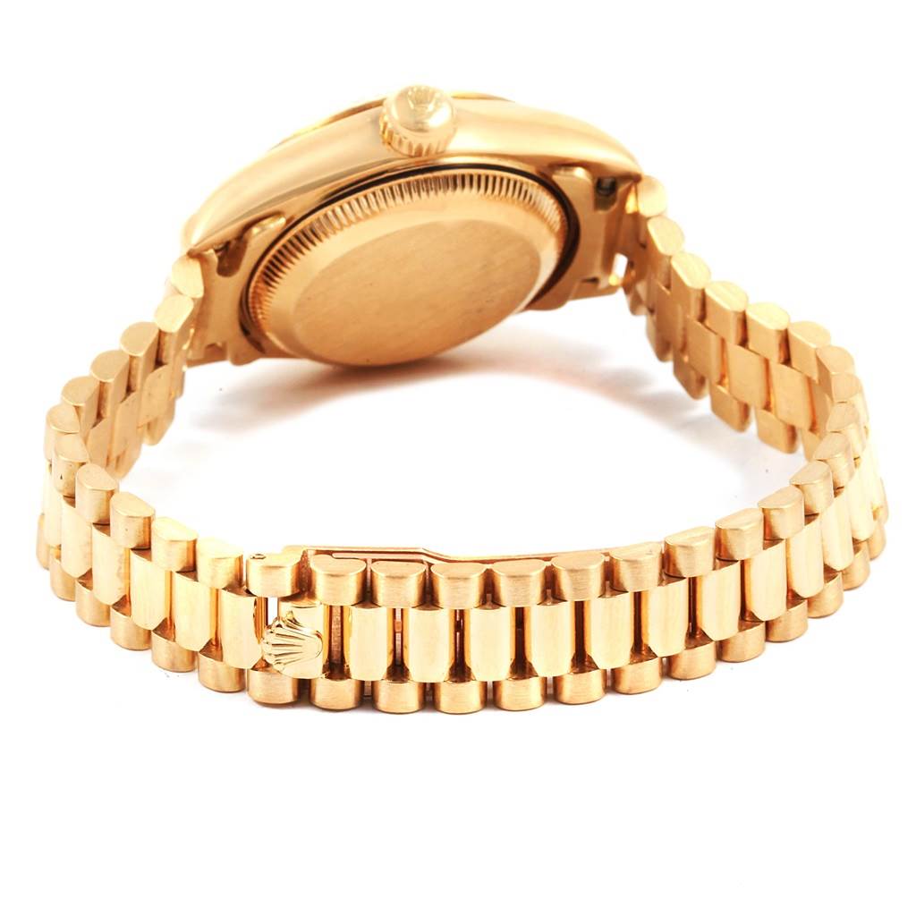 This image shows the back and band of a Rolex President 69178 Women's Yellow Gold White Dial 69178 Women's Yellow Gold White Dial model watch in gold.