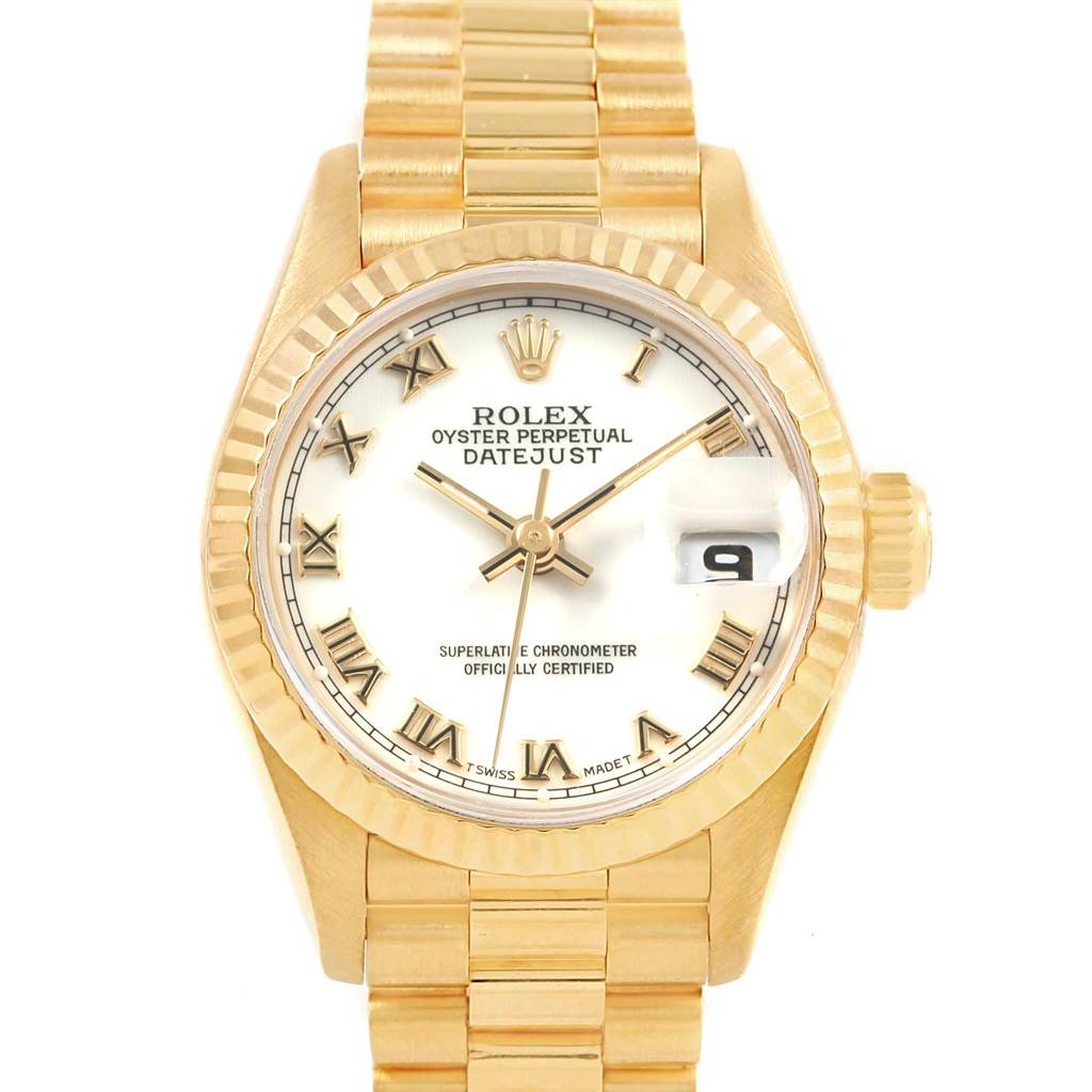This image shows a front view of a Rolex President 69178 Women's Yellow Gold White Dial 69178 Women's Yellow Gold White Dial model watch, highlighting its dial, hands, fluted bezel, and bracelet.