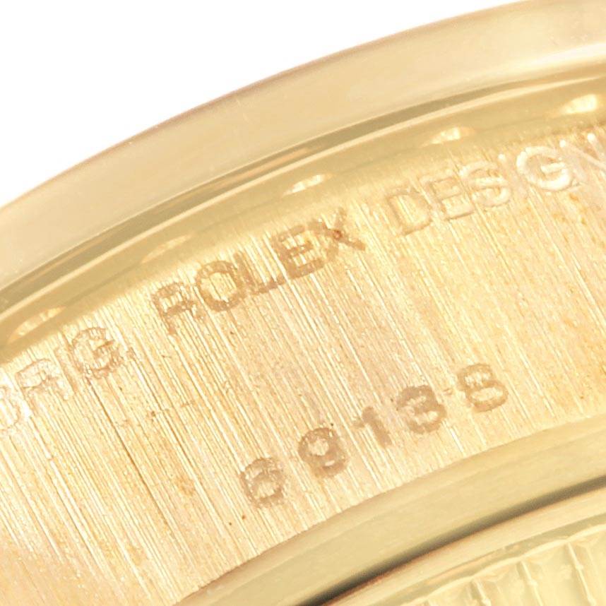 This close-up image shows the engraved inner bezel of a President model by Rolex.