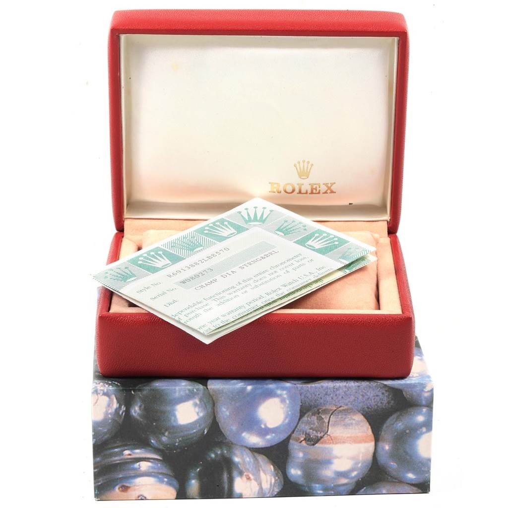 The image shows a Rolex President 69138 Women's Yellow Gold Champagne Dial 69138 Women's Yellow Gold Champagne Dial model watch box with documentation inside.