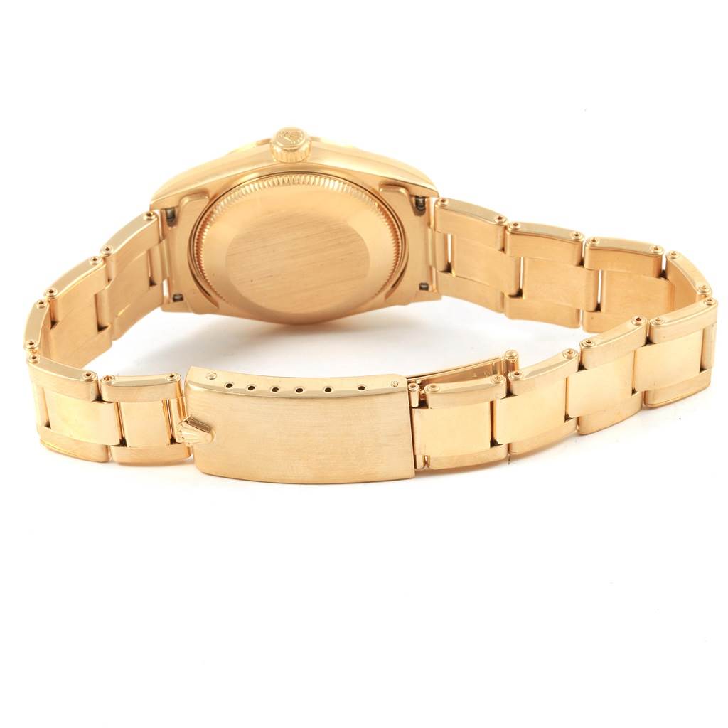 The image shows the back and bracelet of a Rolex President 78278 Women
s Yellow Gold White Dial 78278 Women
s Yellow Gold White Dial model watch laid out flat.