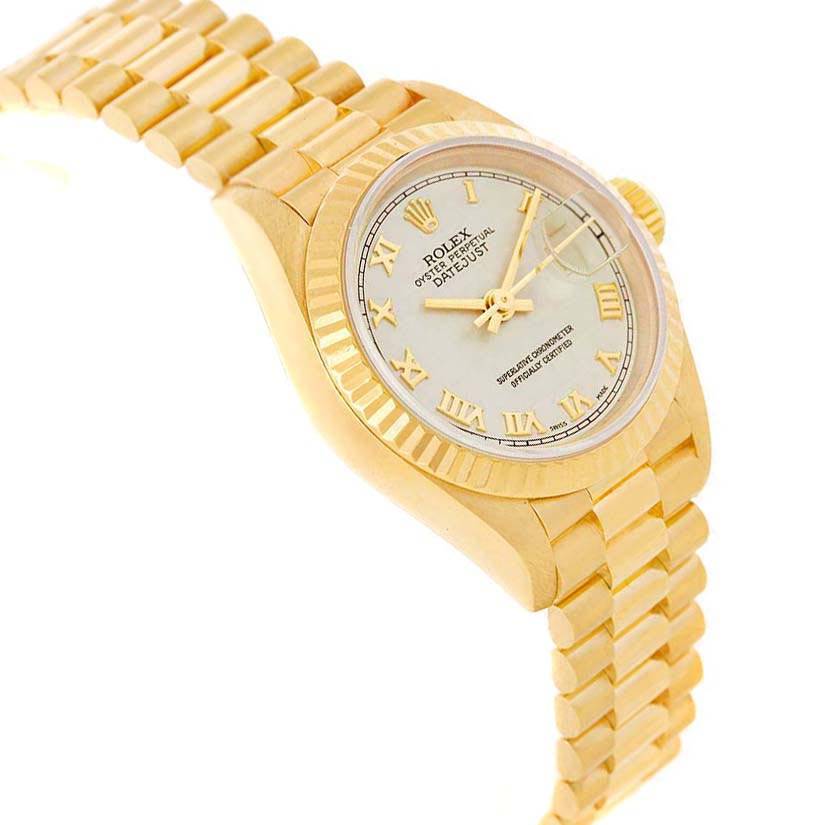 The Rolex President 69178 Women's Yellow Gold Beige Dial 69178 Women's Yellow Gold Beige Dial model watch is shown at a slanted angle, capturing the bracelet, bezel, dial, and crown.