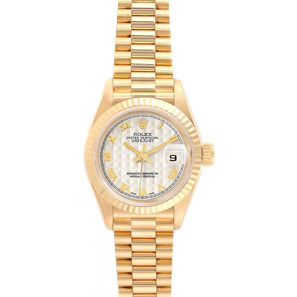 The Rolex President 69178 Women's Yellow Gold Beige Dial 69178 Women's Yellow Gold Beige Dial model watch is shown from a top-down angle, displaying its bracelet, face, and date window.