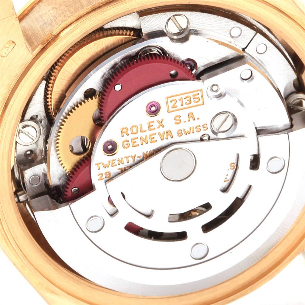 This image shows the intricate internal mechanism of a Rolex President 69178 Women
s Yellow Gold Champagne Dial 69178 Women
s Yellow Gold Champagne Dial model watch, viewed from the back.