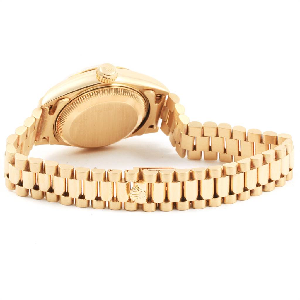 This image shows the backside and bracelet of a Rolex President 69178 Women
s Yellow Gold Champagne Dial 69178 Women
s Yellow Gold Champagne Dial model watch, highlighting the clasp and crown.
