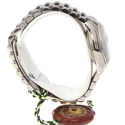 This side view of the Rolex President 179179 Women's White Gold Grey Dial 179179 Women's White Gold Grey Dial watch showcases the band, side of the case, and attached tag.