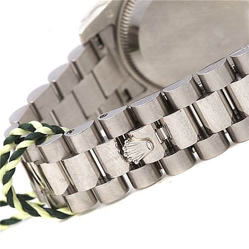 This image shows a close-up of the bracelet of a Rolex President 179179 Women's White Gold Grey Dial 179179 Women's White Gold Grey Dial model watch with the iconic clasp and branding.