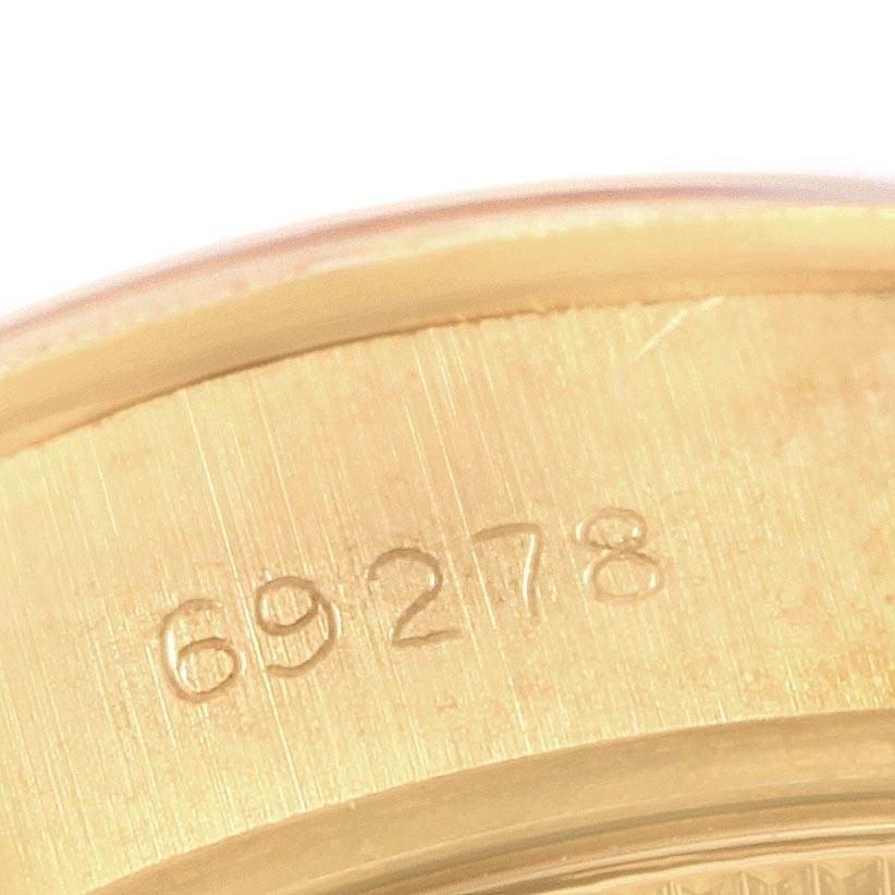 The image shows a close-up of the model number engraving on the case back rim of a Rolex President 69278 Women
s Yellow Gold White Dial 69278 Women
s Yellow Gold White Dial watch.