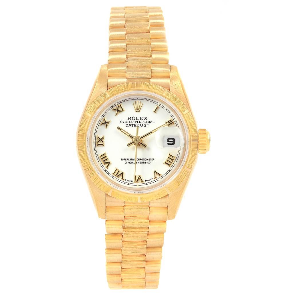 The image shows a Rolex President 69278 Women
s Yellow Gold White Dial 69278 Women
s Yellow Gold White Dial model watch, featuring the full face, band, and crown, viewed from a top-down angle.