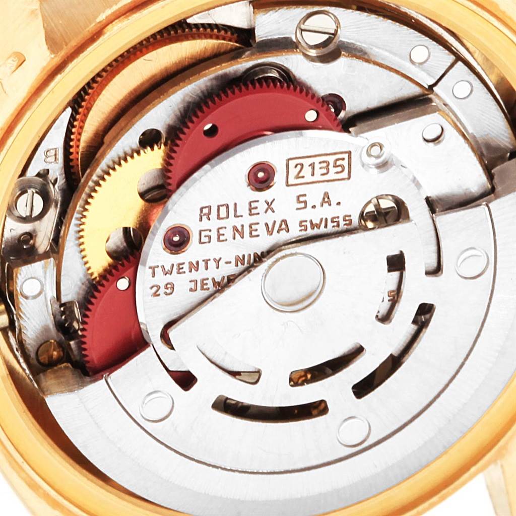 This image shows a close-up view of the internal mechanism of a Rolex President 69138 Women
s Yellow Gold Black Dial 69138 Women
s Yellow Gold Black Dial model watch.
