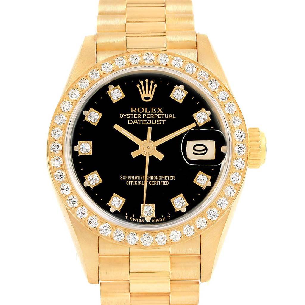 This is a front-angle view of a Rolex President 69138 Women
s Yellow Gold Black Dial 69138 Women
s Yellow Gold Black Dial model watch showing the dial, bezel, and part of the bracelet.