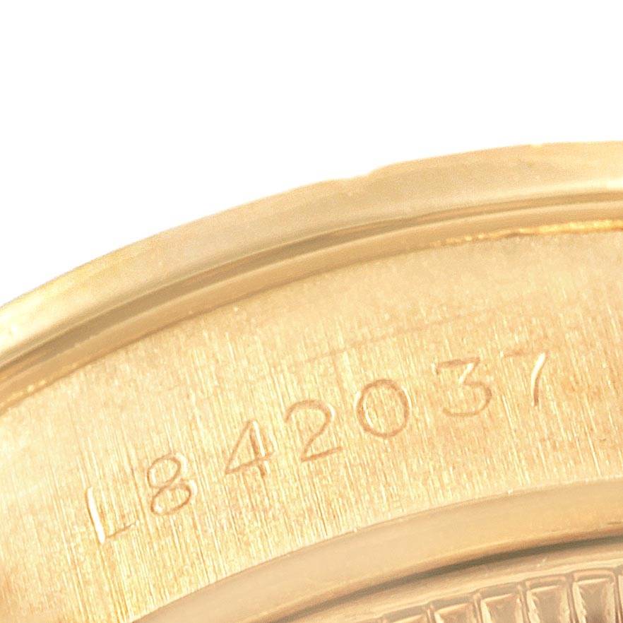 This close-up image shows the serial number engraving on the gold casing of a Rolex President 79088 Women
s Yellow Gold Champagne Dial 79088 Women
s Yellow Gold Champagne Dial model watch.