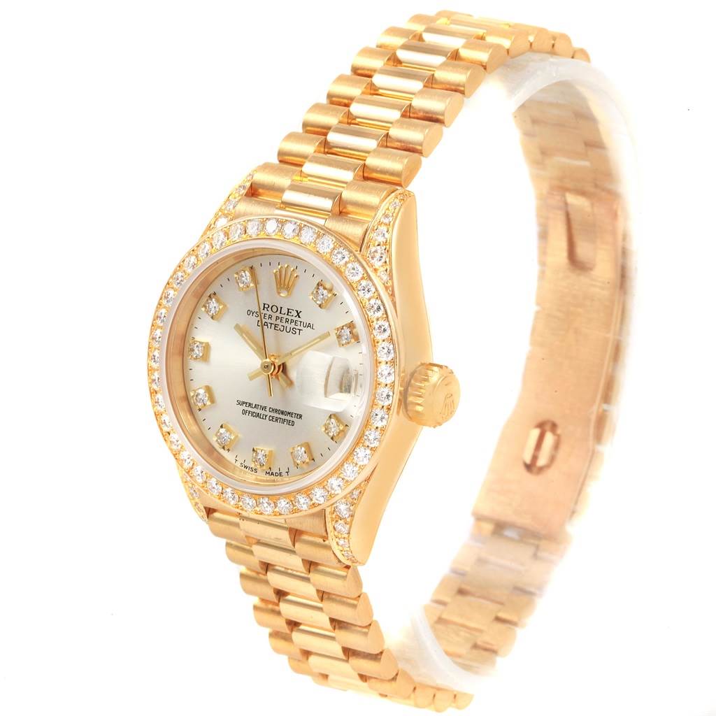 The Rolex President 69238 Women's Yellow Gold Silver Dial 69238 Women's Yellow Gold Silver Dial model watch is shown at an angle displaying its face, bezel, crown, and bracelet.