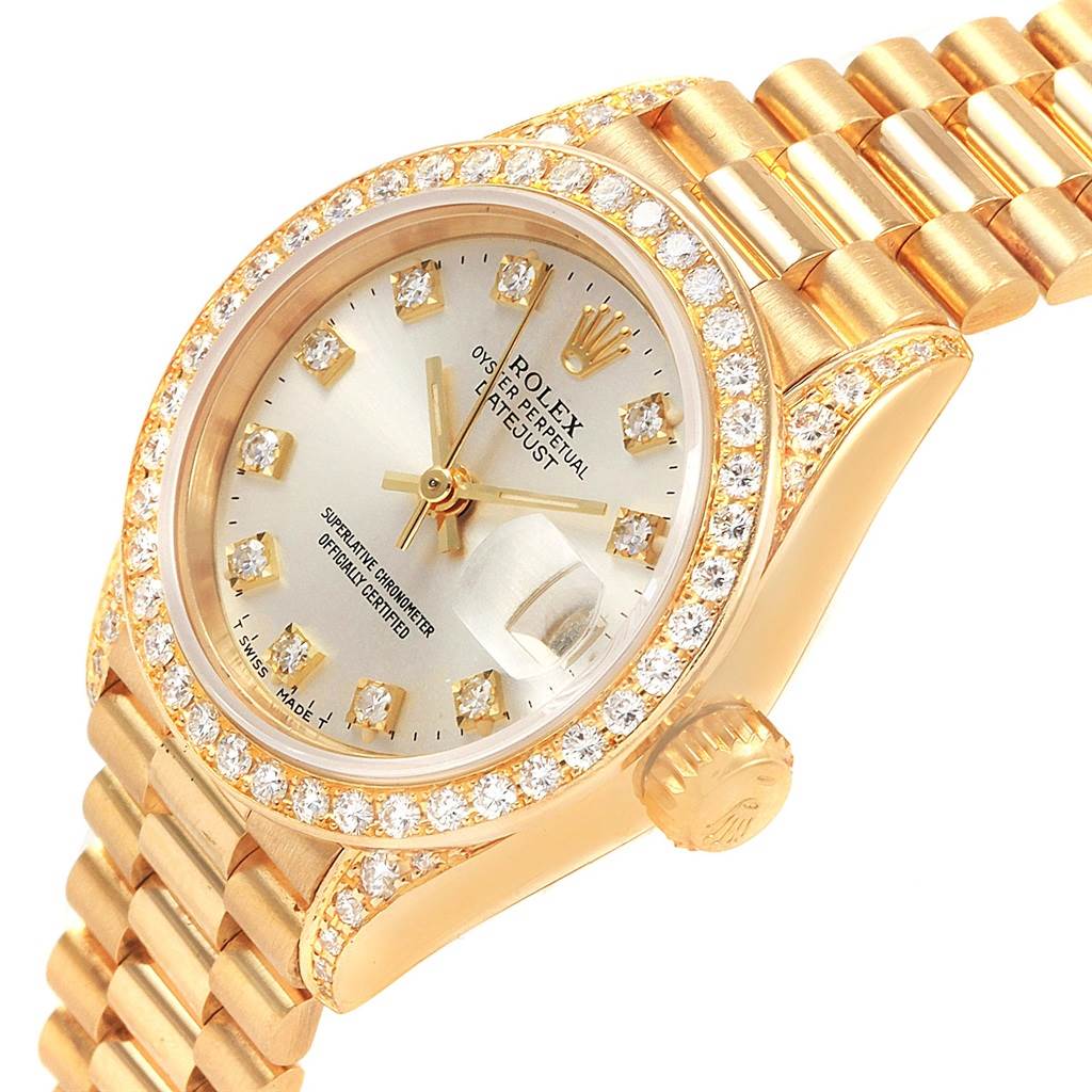 The image shows a close-up angle of the Rolex President 69238 Women's Yellow Gold Silver Dial 69238 Women's Yellow Gold Silver Dial model watch, highlighting the dial, diamond-studded bezel, and bracelet.