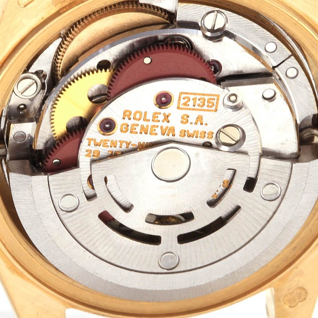This image shows a close-up of the inner mechanical movement of a Rolex President 69238 Women's Yellow Gold Silver Dial 69238 Women's Yellow Gold Silver Dial model watch.