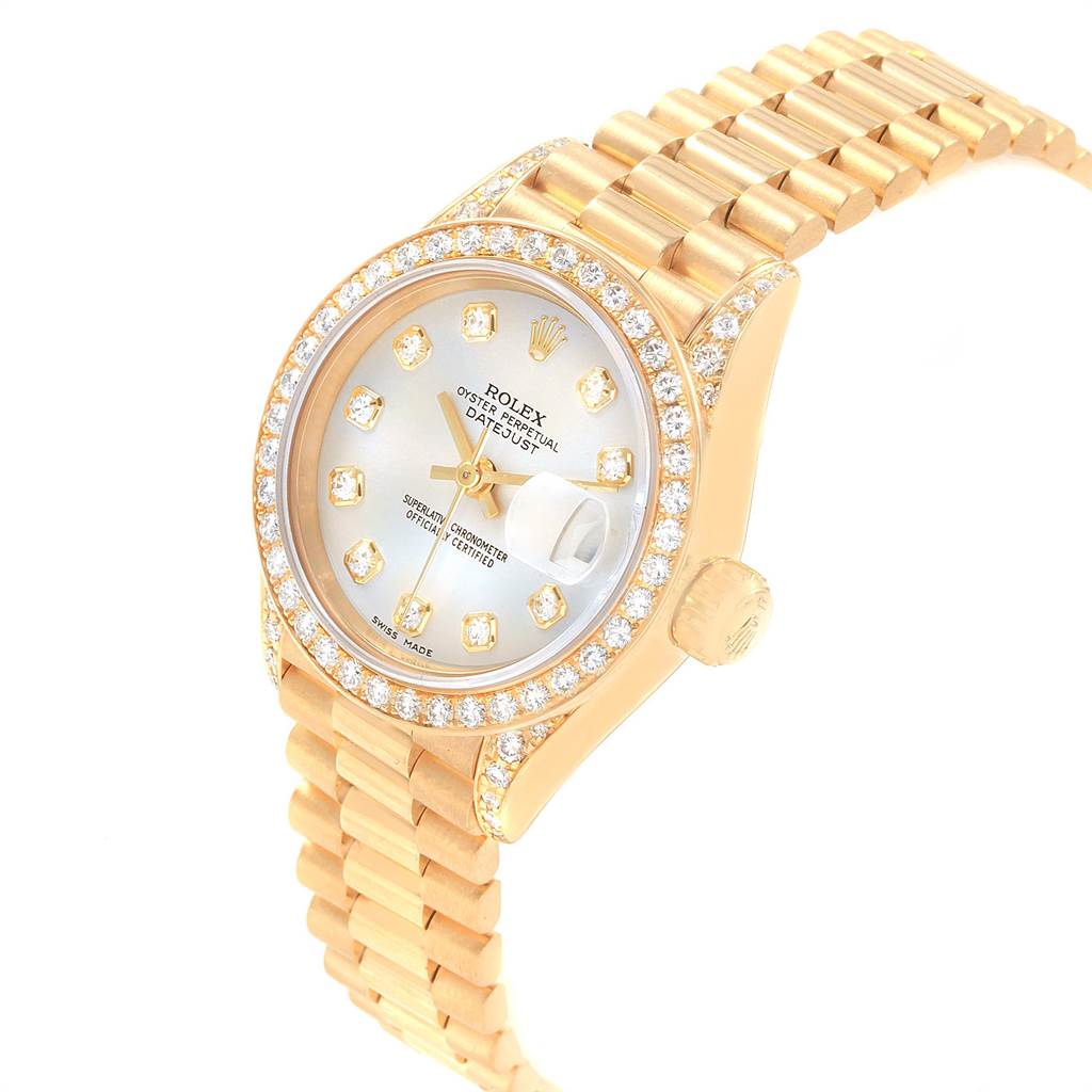 The image shows a Rolex President 69158 Women
s Yellow Gold Mother of Pearl Dial 69158 Women
s Yellow Gold Mother of Pearl Dial model watch at a slight angle, highlighting its dial, bezel with diamonds, and part of the bracelet.