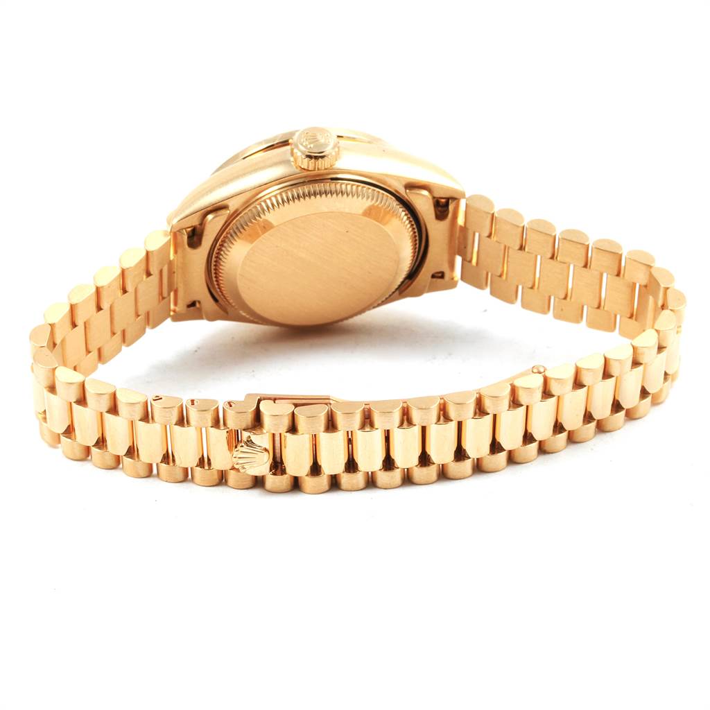 This image shows the back and bracelet of a Rolex President 69158 Women
s Yellow Gold Mother of Pearl Dial 69158 Women
s Yellow Gold Mother of Pearl Dial model watch.
