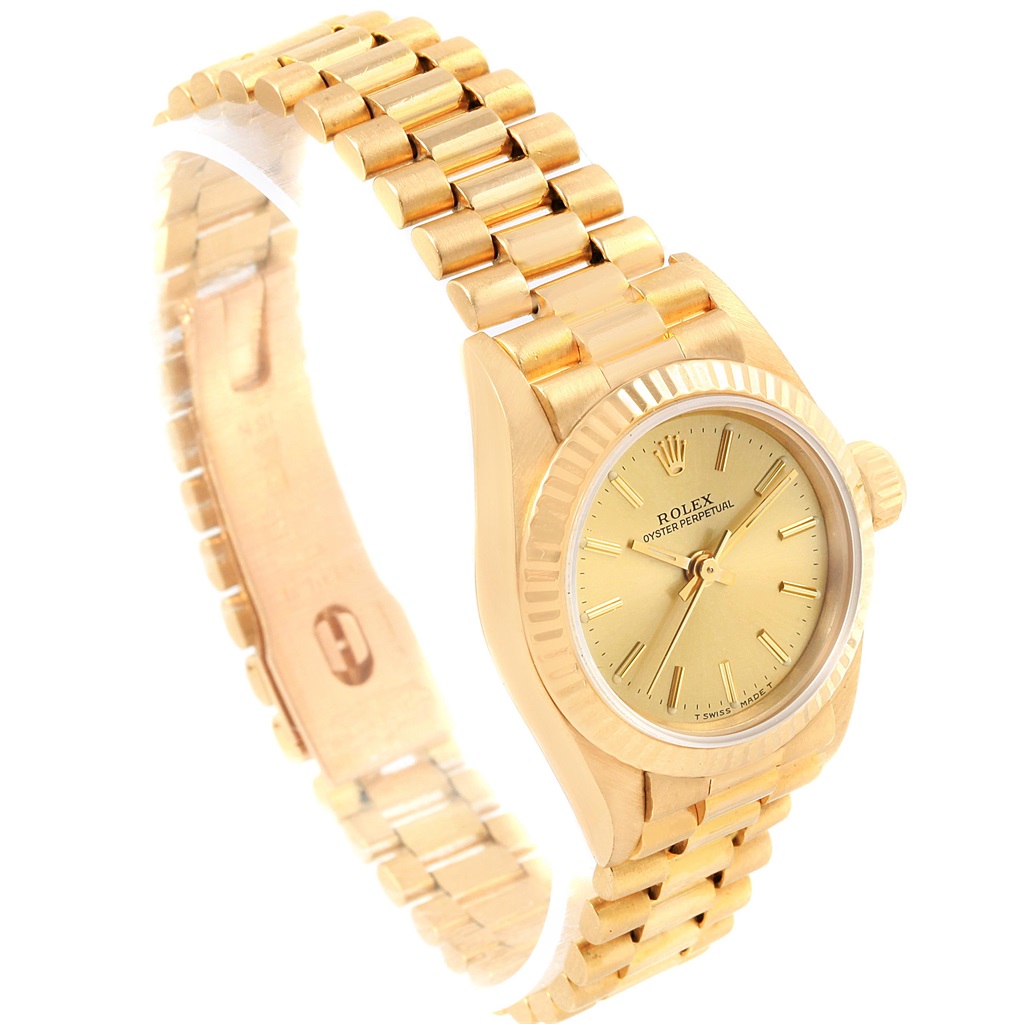 The image shows a Rolex President 67198 Women's Yellow Gold Champagne Dial 67198 Women's Yellow Gold Champagne Dial model watch angled to display its face, bezel, crown, and bracelet.