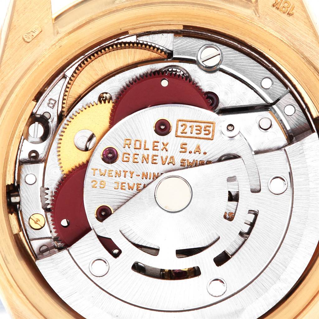 This close-up image shows the internal movement mechanism of a Rolex President 69288 Women
s Yellow Gold Champagne Dial 69288 Women
s Yellow Gold Champagne Dial model watch.