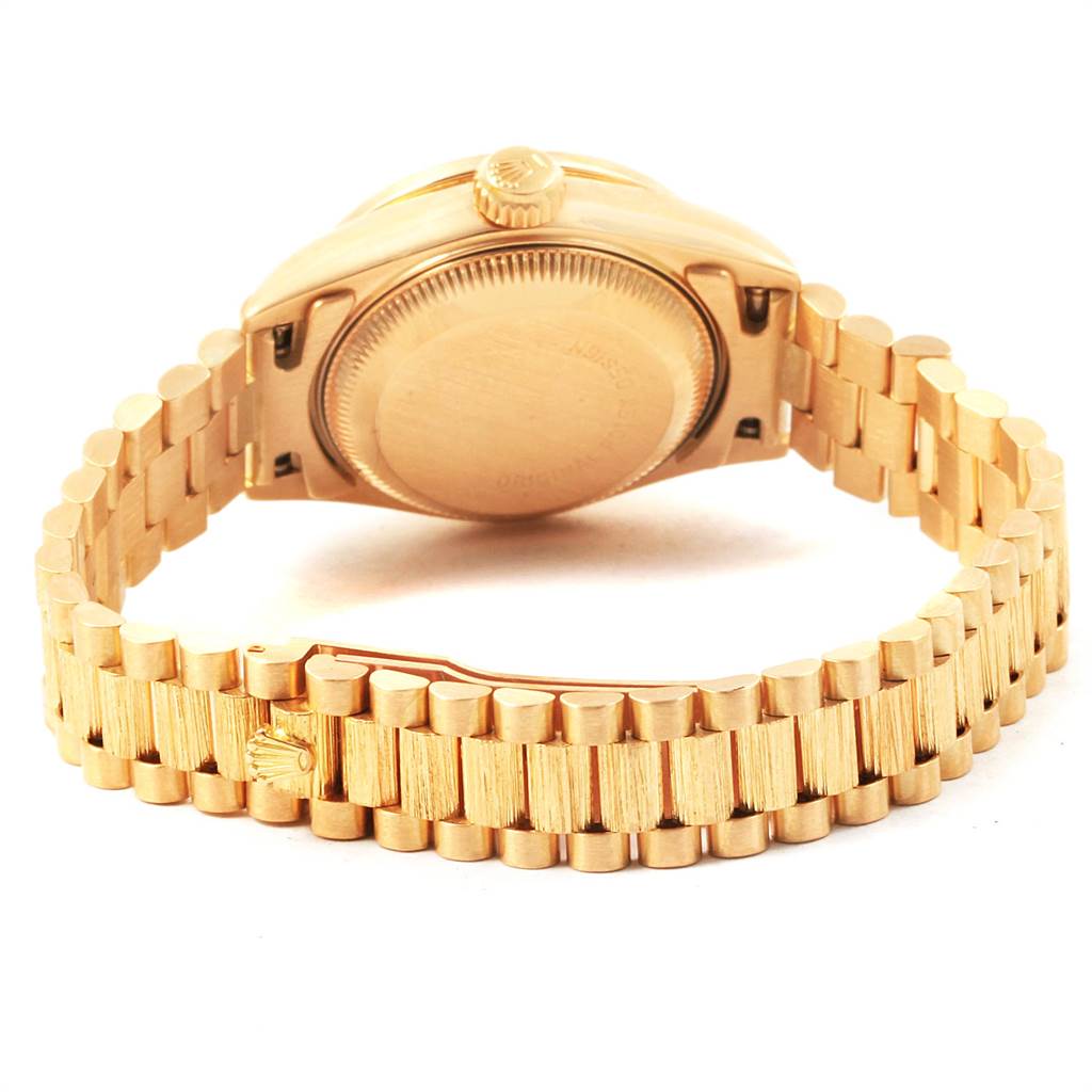 This image shows the back case and bracelet of a Rolex President 69288 Women
s Yellow Gold Champagne Dial 69288 Women
s Yellow Gold Champagne Dial model watch from a rear angle.