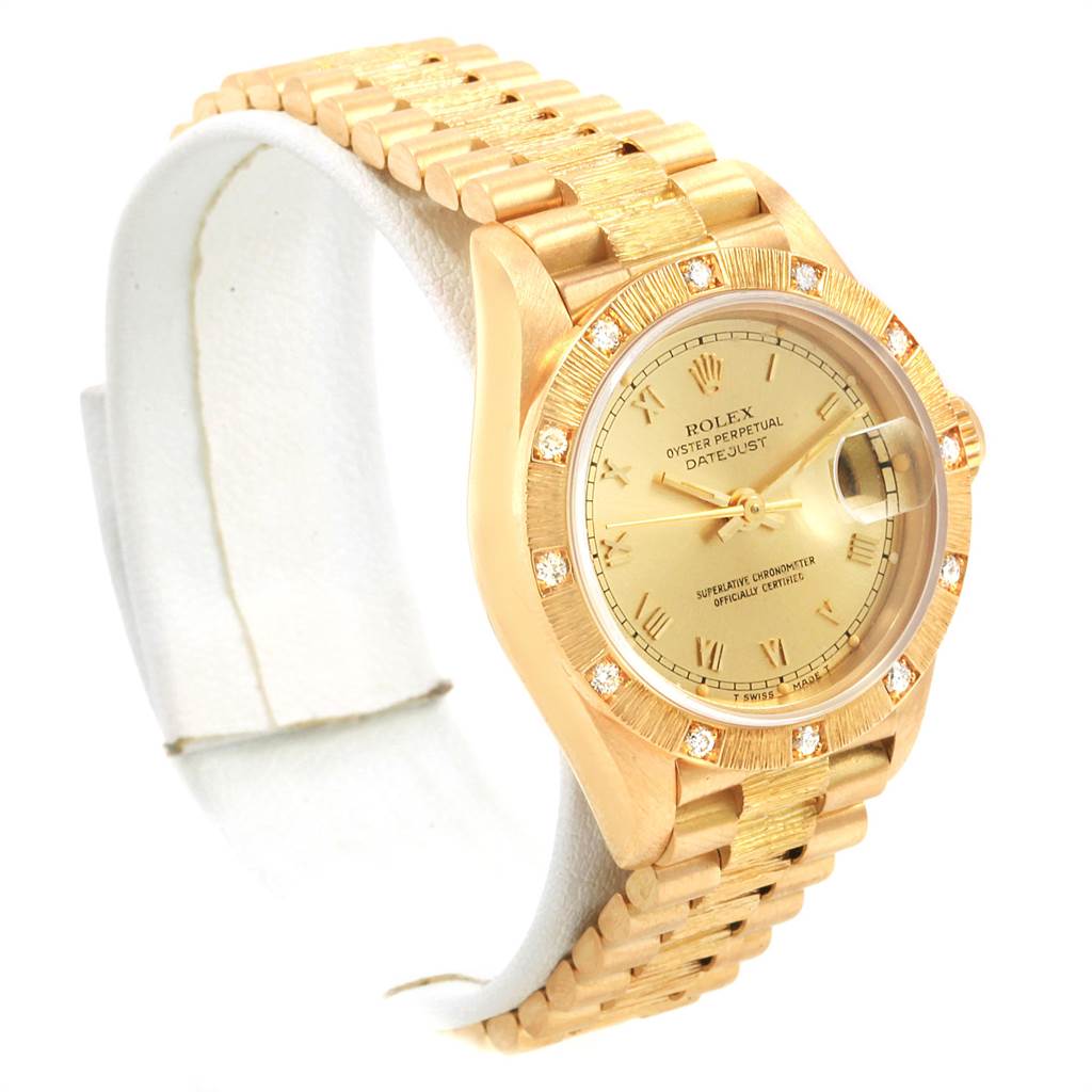 The image shows a side view angle of the Rolex President 69288 Women
s Yellow Gold Champagne Dial 69288 Women
s Yellow Gold Champagne Dial model watch with its gold bracelet, bezel, and dial clearly visible.