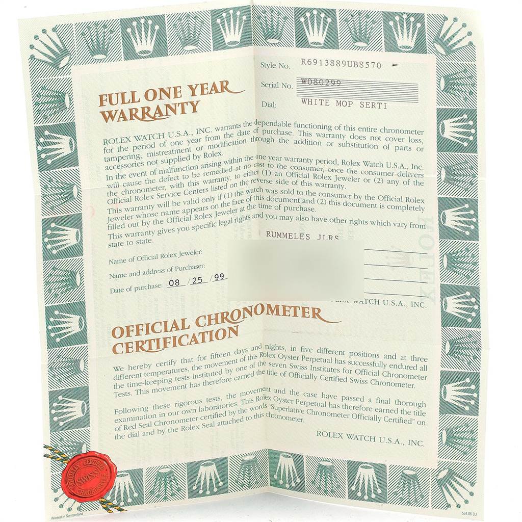 This is a Rolex President 69138 Women
s Yellow Gold Mother of Pearl Dial 69138 Women
s Yellow Gold Mother of Pearl Dial model warranty card showing serial number, style, certification, and official chronometer certification.