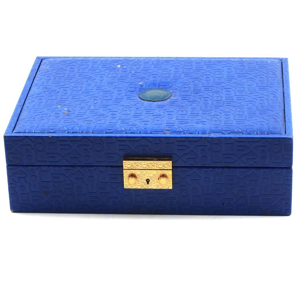 The image shows a blue Rolex President 179238 Women
s Yellow Gold Mother of Pearl Dial 179238 Women
s Yellow Gold Mother of Pearl Dial model watch box with a gold-colored latch, viewed from the front.