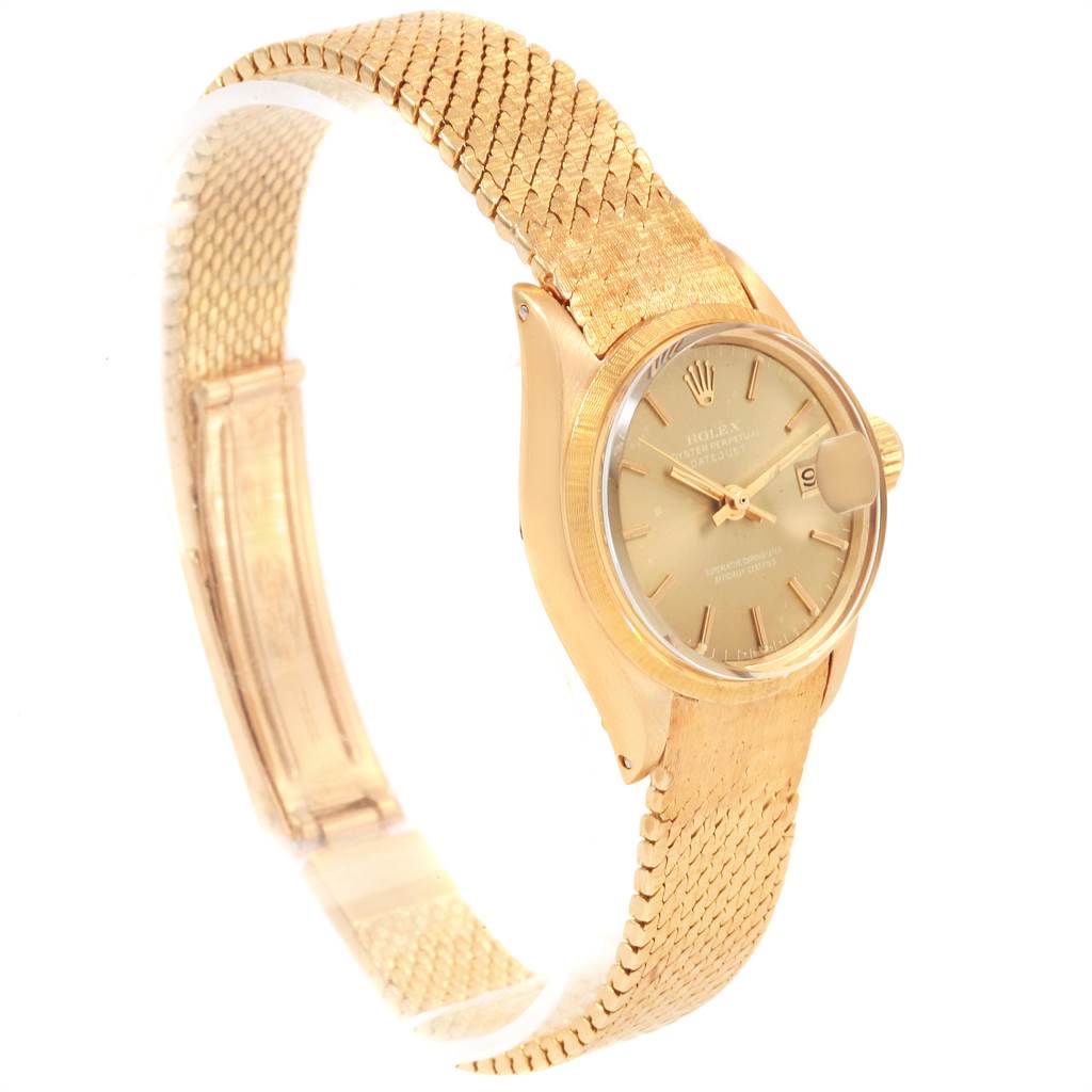This image shows a side angle of the Rolex President 6703 Women's Yellow Gold Champagne Dial 6703 Women's Yellow Gold Champagne Dial model watch, highlighting its band, case, and dial.