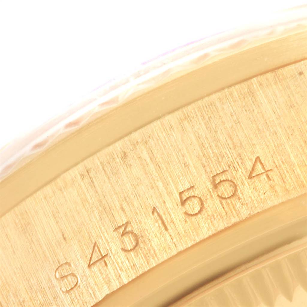 The image shows the serial number engraving on the side case of a Rolex President 68278 Women
s Yellow Gold Champagne Dial 68278 Women
s Yellow Gold Champagne Dial model watch.