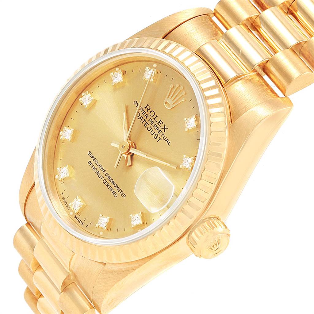 This image shows a close-up angled view of the Rolex President 68278 Women
s Yellow Gold Champagne Dial 68278 Women
s Yellow Gold Champagne Dial watch with a gold dial, bezel, crown, and bracelet.