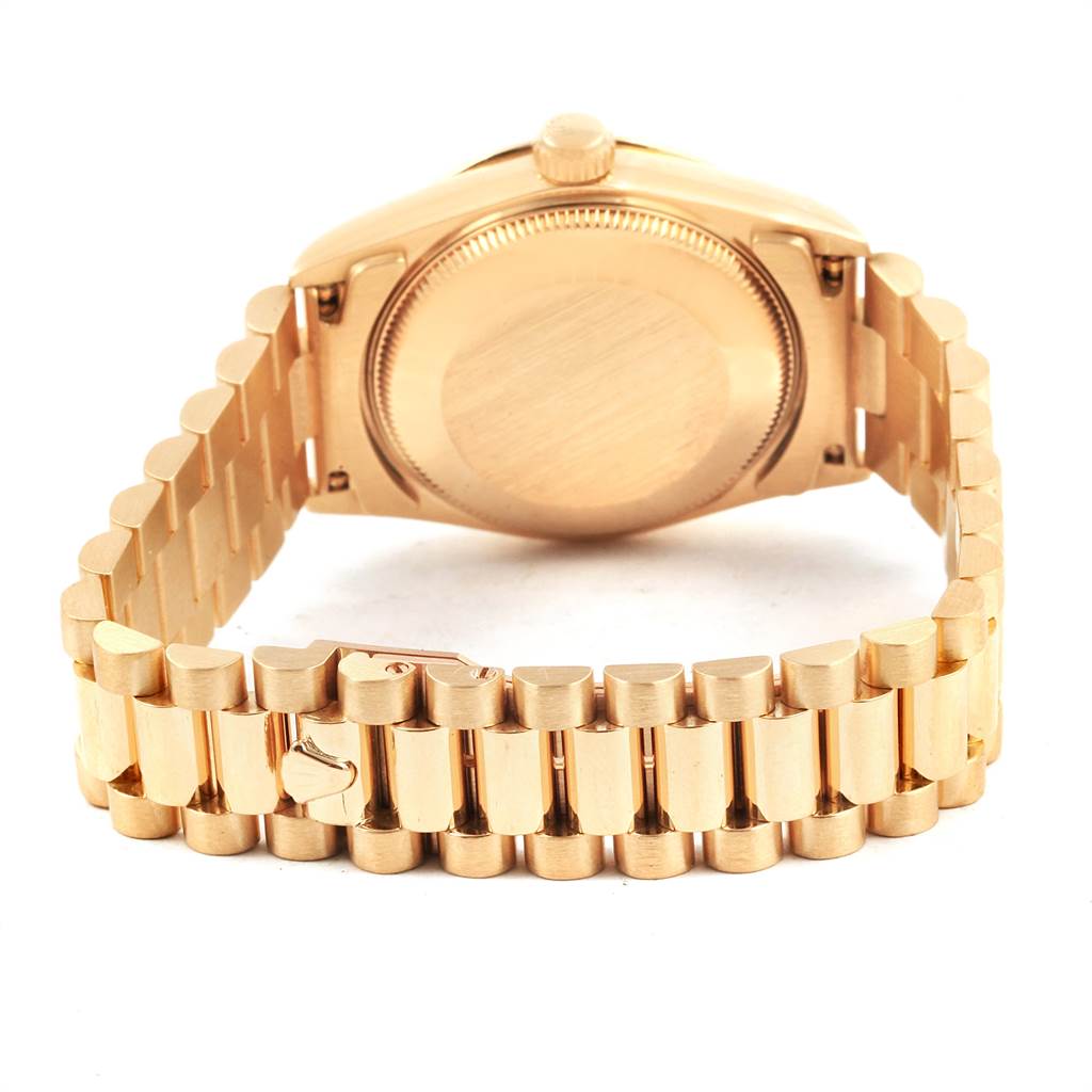 This image shows the back case and President bracelet of a Rolex President 68258 Women
s Yellow Gold Champagne Dial 68258 Women
s Yellow Gold Champagne Dial model watch from a rear angle.