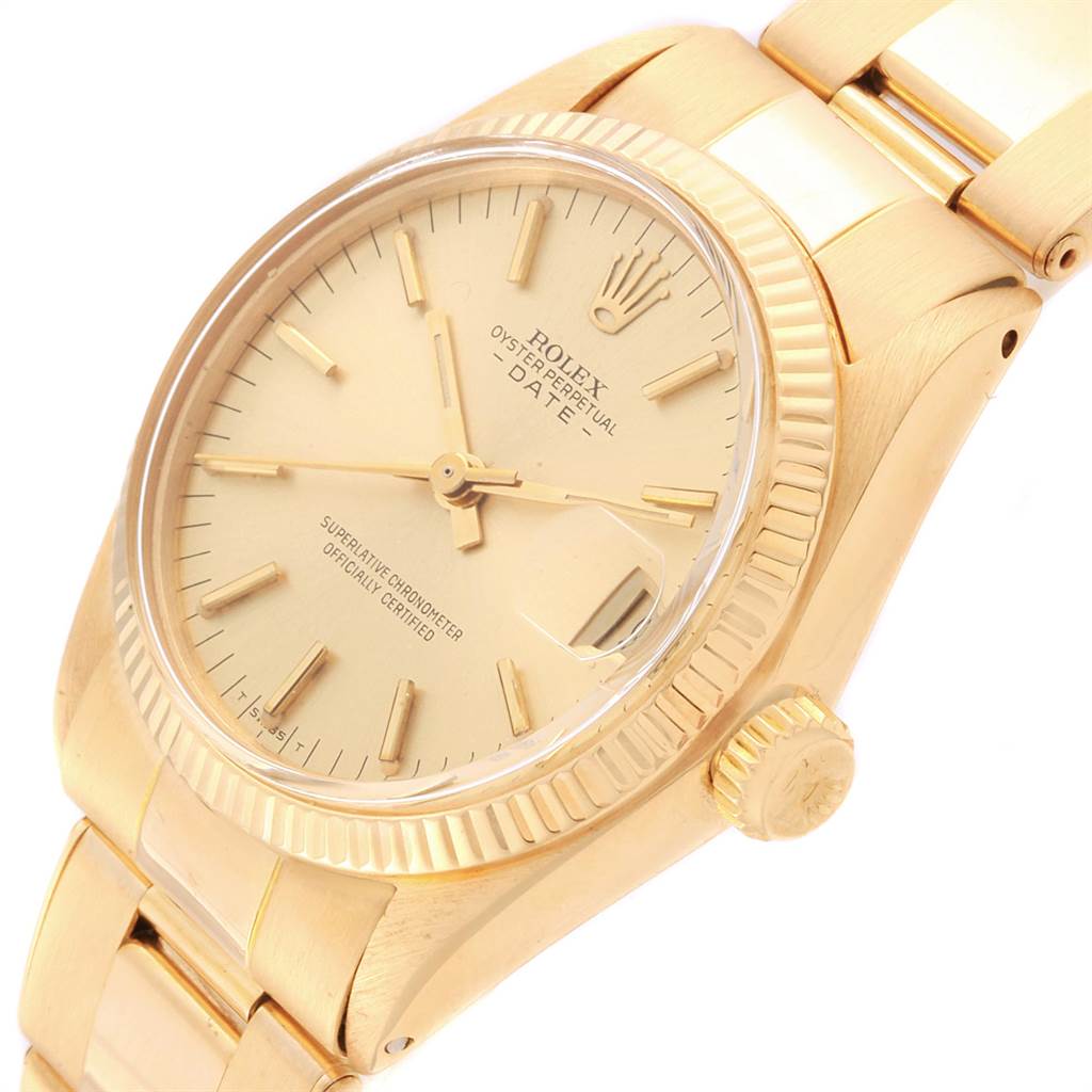 The Rolex President 6827 Women
s Yellow Gold Champagne Dial 6827 Women
s Yellow Gold Champagne Dial model watch is shown at an angle highlighting the dial, case, bezel, crown, and part of the bracelet.