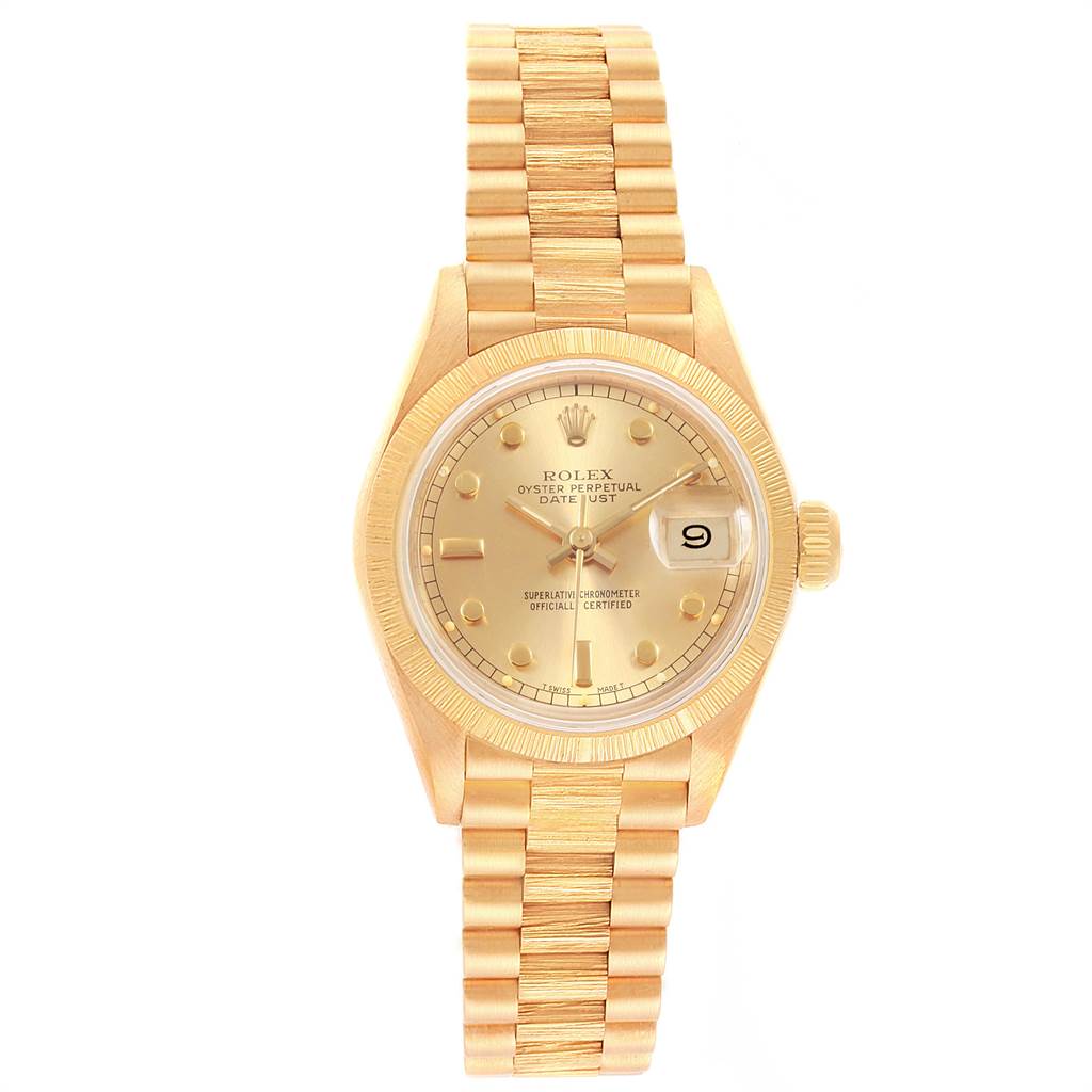 The image shows a Rolex President 69278 Women
s Yellow Gold Champagne Dial 69278 Women
s Yellow Gold Champagne Dial model watch from a front angle, displaying the face, bezel, dial, bracelet, and date window.