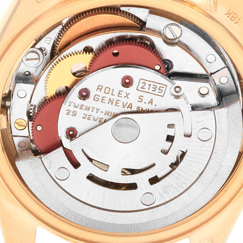 This image shows the internal movement mechanism of a Rolex President 69278 Women
s Yellow Gold Champagne Dial 69278 Women
s Yellow Gold Champagne Dial model watch from a close-up rear angle.