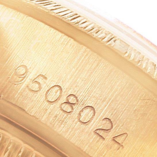 This close-up image shows the serial number engraved on the side of a Rolex President 69278 Women
s Yellow Gold Champagne Dial 69278 Women
s Yellow Gold Champagne Dial watch case.