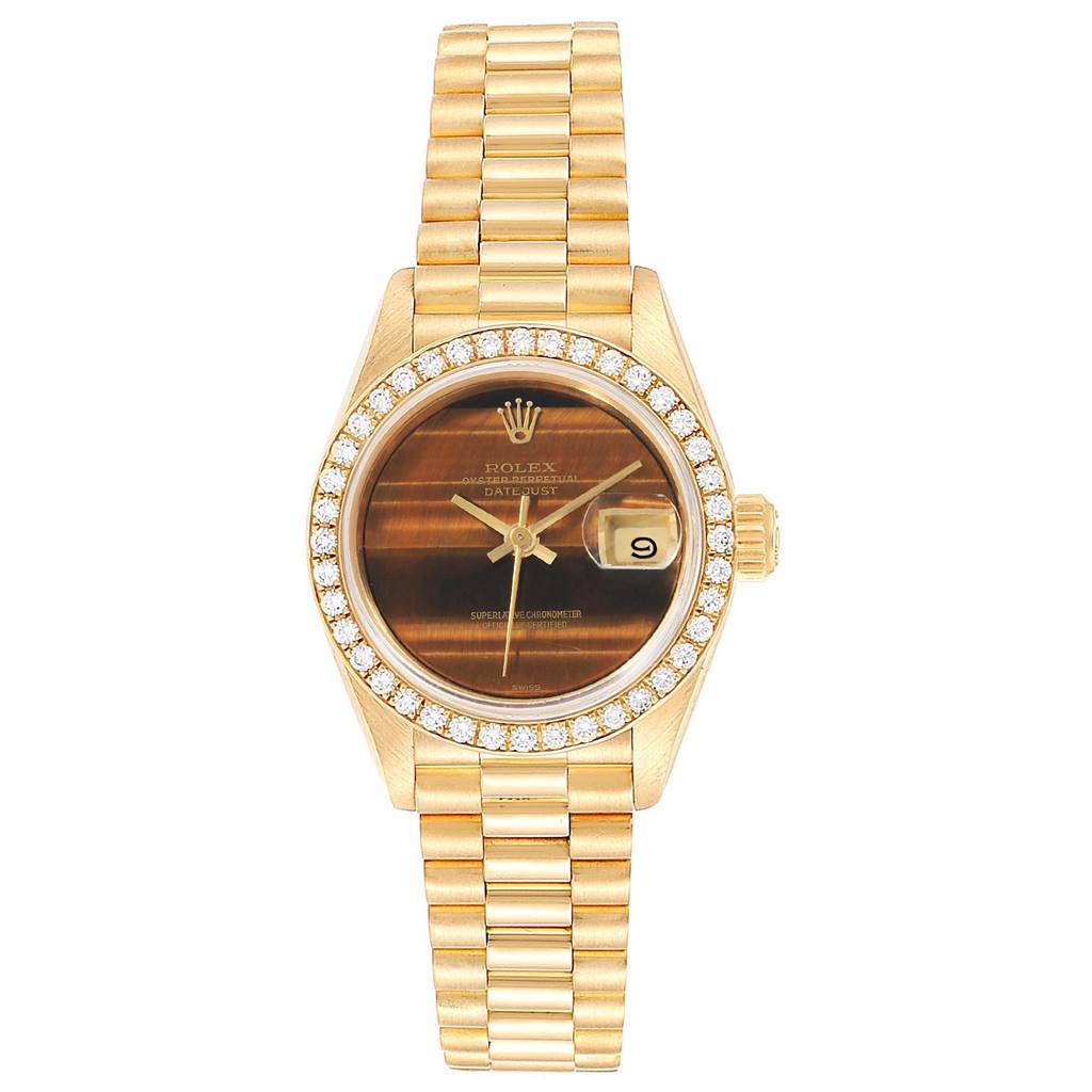 The image shows a front view of a Rolex President 69138 Women's Yellow Gold Brown Dial 69138 Women's Yellow Gold Brown Dial model watch, highlighting its gold bracelet, bezel, and dial.
