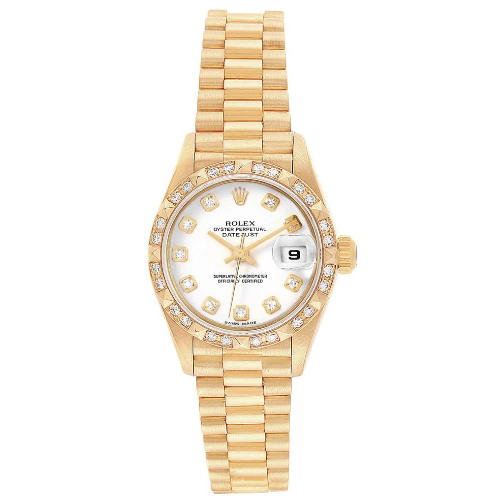 This Rolex President 69258 Women
s Yellow Gold White Dial 69258 Women
s Yellow Gold White Dial model watch is shown from a top-down angle, highlighting its gold bracelet, diamond-encrusted bezel, and white dial.