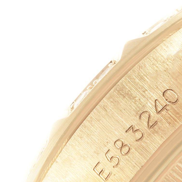 The image shows a close-up of the side of a Rolex President 69258 Women
s Yellow Gold White Dial 69258 Women
s Yellow Gold White Dial model watch, highlighting the serial number etched on the case.