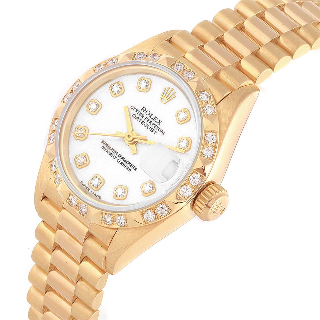 The image shows a close-up angled view of the Rolex President 69258 Women
s Yellow Gold White Dial 69258 Women
s Yellow Gold White Dial model, displaying the watch face, bezel, crown, and bracelet.