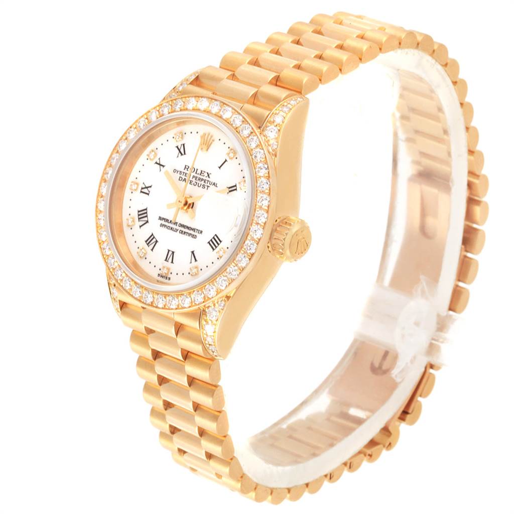 This image shows a side and top view of a Rolex President 69158 Women
s Yellow Gold White Dial 69158 Women
s Yellow Gold White Dial model watch, highlighting its gold bracelet and diamond bezel.