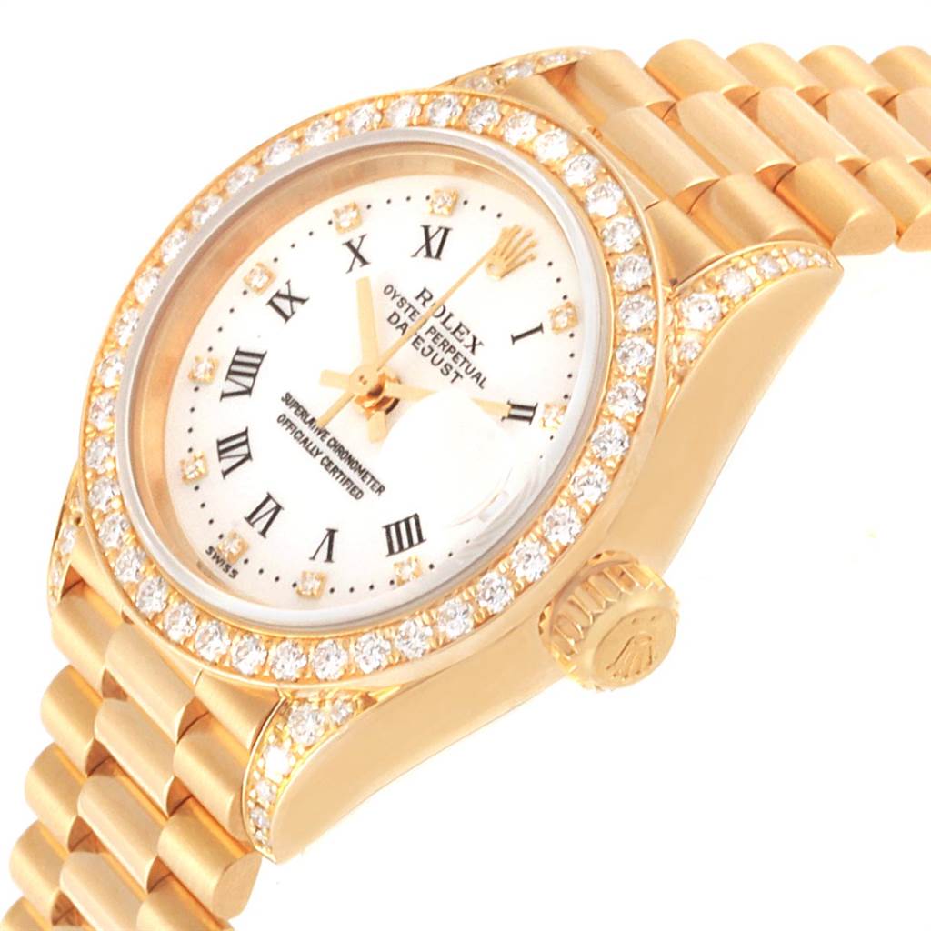The image shows a detailed view of the Rolex President 69158 Women
s Yellow Gold White Dial 69158 Women
s Yellow Gold White Dial watch model, including the dial, bezel, and part of the bracelet.