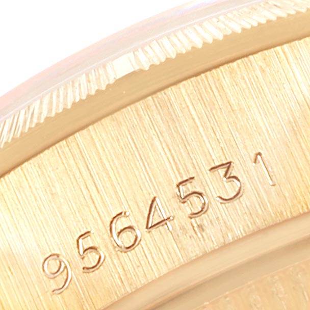 This is a close-up of the serial number engraved on the case of a Rolex President 69278 Women
s Yellow Gold White Dial 69278 Women
s Yellow Gold White Dial model.