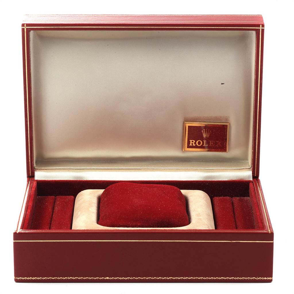 The image shows an open, empty Rolex President 69278 Women
s Yellow Gold White Dial 69278 Women
s Yellow Gold White Dial watch box from a front angle. 