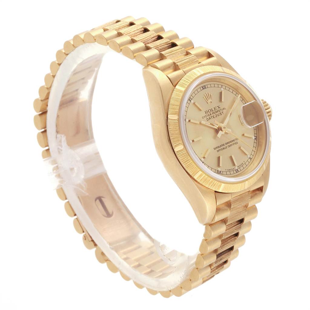 The image shows a mid-side view of the Rolex President 69278 Women
s Yellow Gold Champagne Dial 69278 Women
s Yellow Gold Champagne Dial model watch, highlighting its gold bracelet and bezel.